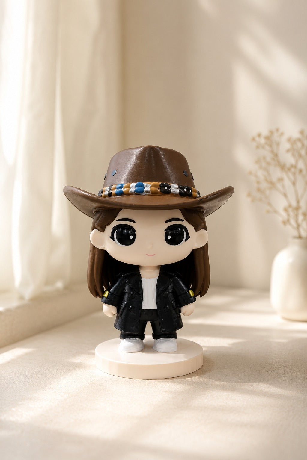 Finished cowboy-style custom figurine displayed in editorial light